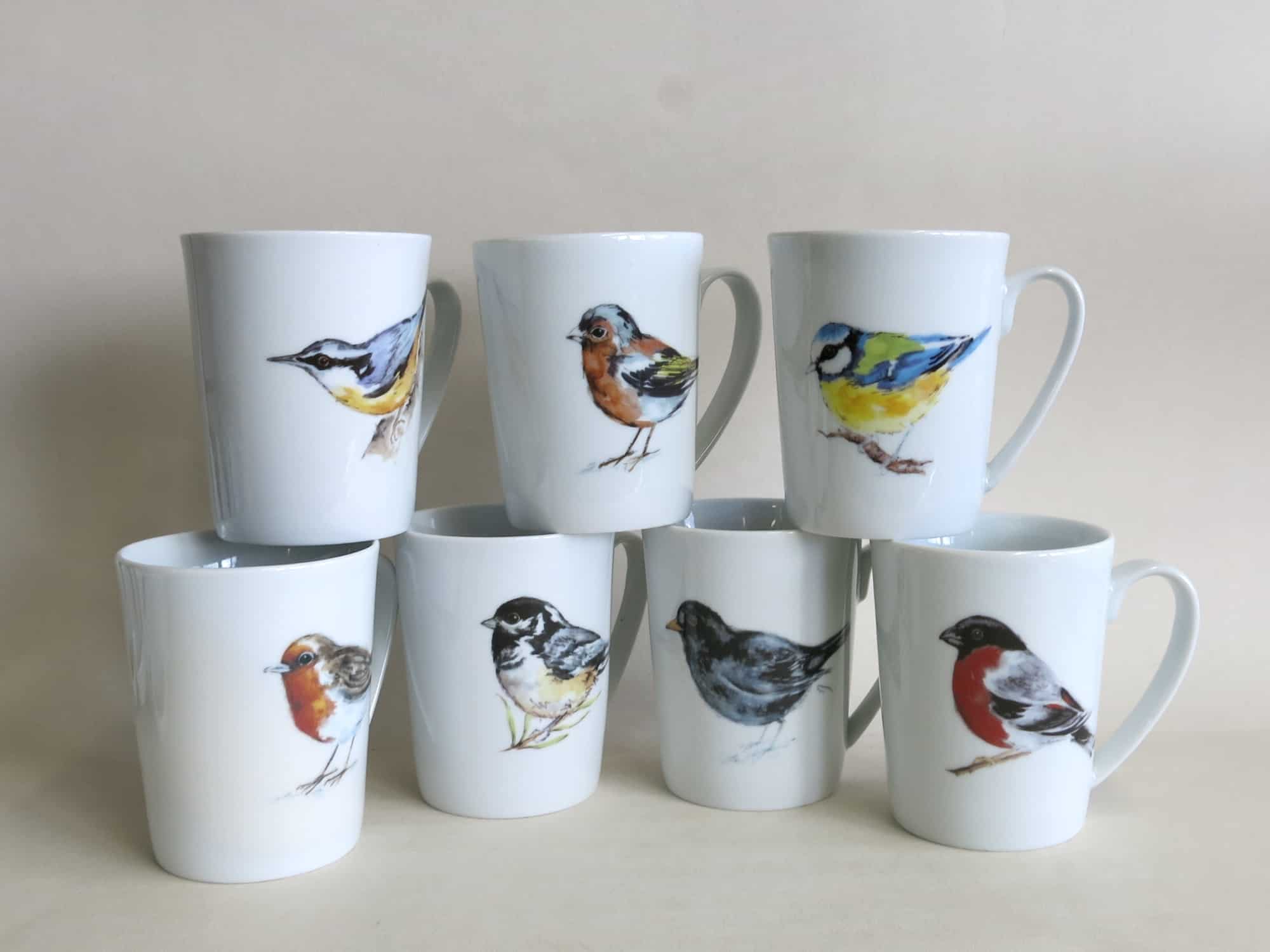 Gruppenbild Porzellanbecher Sissi mit 7 Singvogel Motiven aquarell